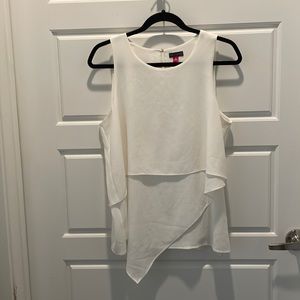 EUC Vince Camuto white silky shell with asymmetrical, tiered overlay, size M.